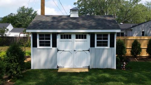 Wood-garden-cape-cod-with-transom-doors-and-cupola